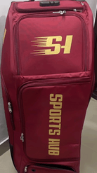 Front view of the Sports Hub Pro Edition cricket kit bag in maroon and gold featuring a secure integrated number lock and large storage compartment.